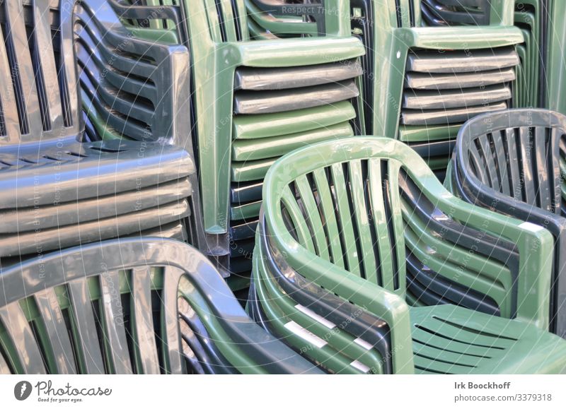 stacked plastic chairs in monochrome colours Style Design Chair Garden chair Plastic chair Relaxation Sit Blue Green Monochrome Subdued colour Reflection