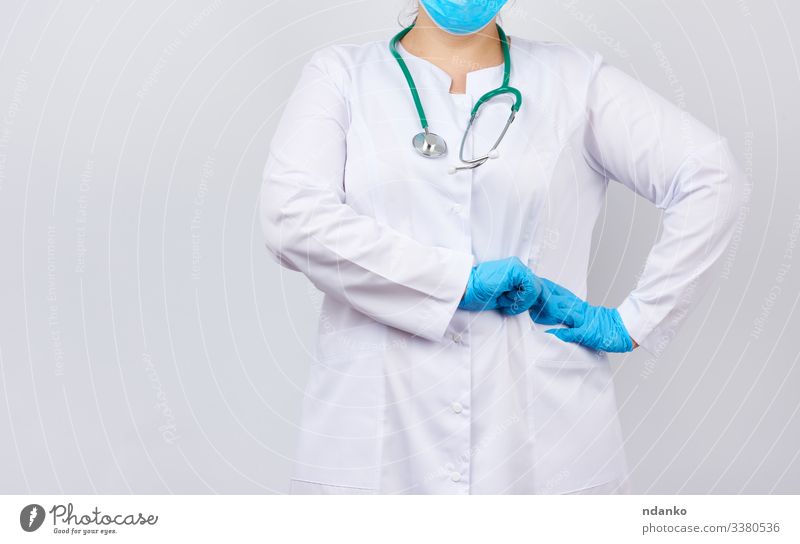 Health care Medication Profession Doctor Hospital Human being Woman Adults Arm Hand Coat Gloves Stand Friendliness Blue White Caucasian clinic Conceptual design