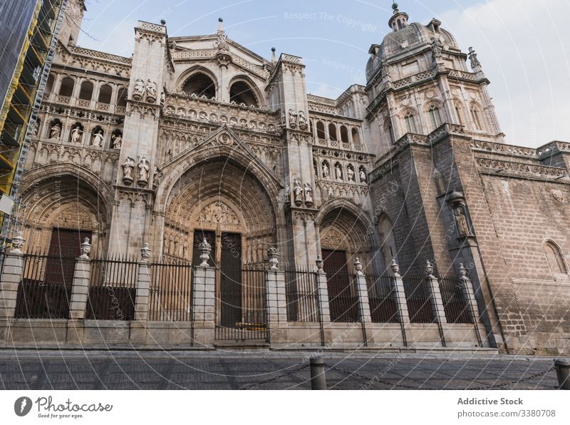 Facade of old stone Gothic cathedral architecture historic building gothic ancient medieval facade city culture exterior town travel tourism destination