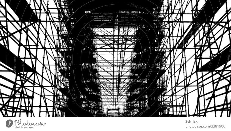 Photograph scaffolding at a bridge in black and white Scaffold Bridge photo graphic Black & white photo sharp contrasts high contrast Skeleton graphically Graph