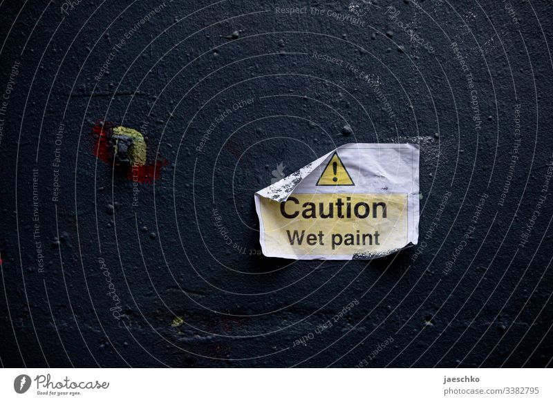 Sign "Caution - wet paint" on a wall Colour freshly painted Painting (action, work) Damp Wall (building) Clue Signage Warn Warning sign painting works