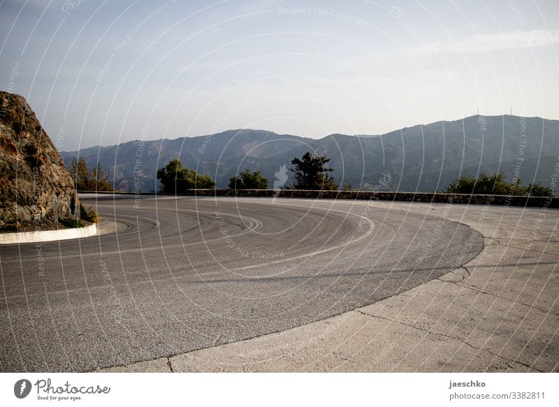 mountain bend Curve Street Winding road mountains Motoring Pass Empty Mountain Landscape Vacation & Travel Mediterranean Traffic infrastructure Transport travel