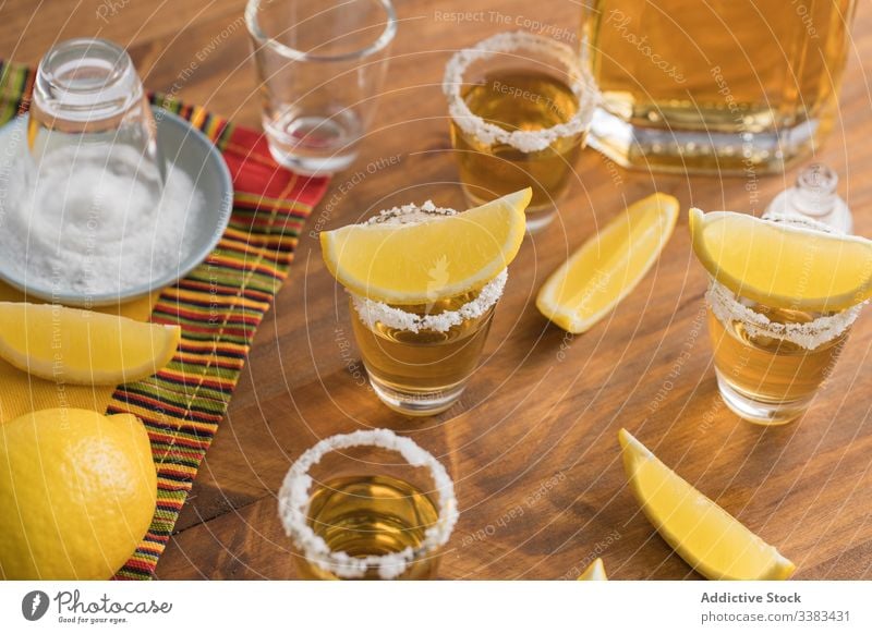 Tequila In Shots With Salt Rim And Lemon A Royalty Free Stock Photo From Photocase