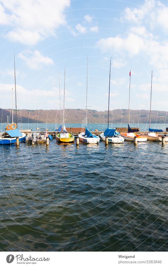 Boats on the Laacher See Boating trip Lake Lakeside Water Spring Sailing Rowing Sailboat be afloat