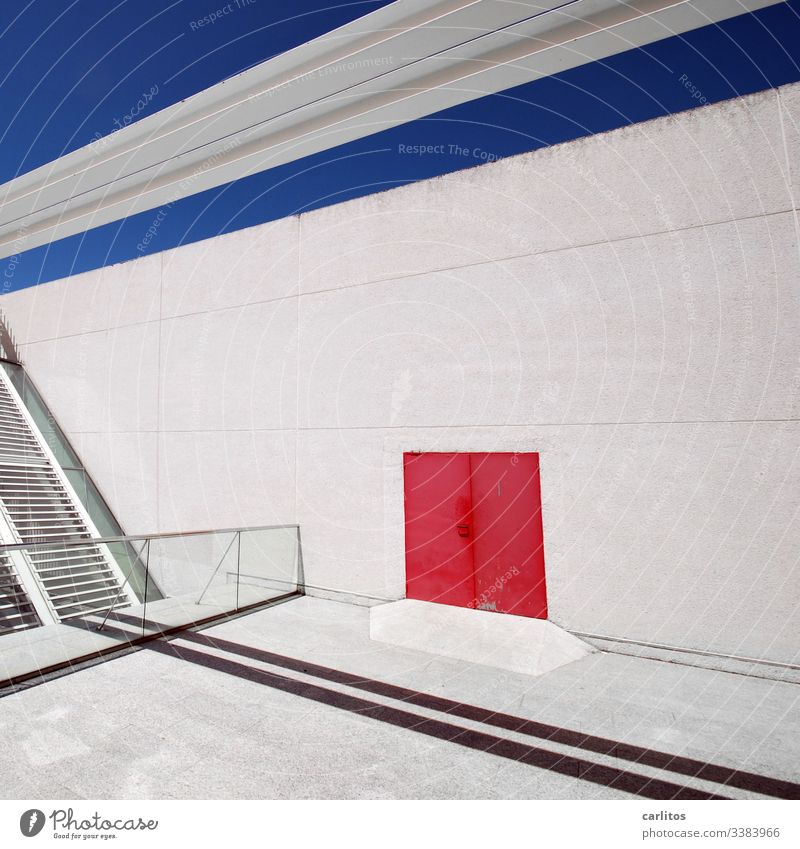 Red door on white wall with blue line under blue sky Wall (building) Facade Door Goal Line mark Blue Sky lines interstices Shadow Handrail Glass slats