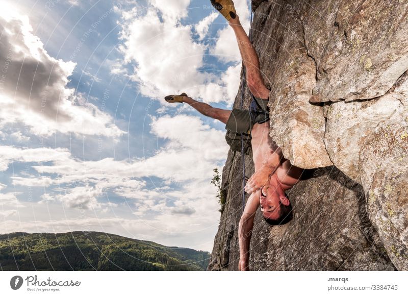 rest Sports Climbing Free climber Sky peril Clouds free torso Wall of rock Brave Man Trust Safety Joy Steep Muscular Rock Mountaineering Leisure and hobbies