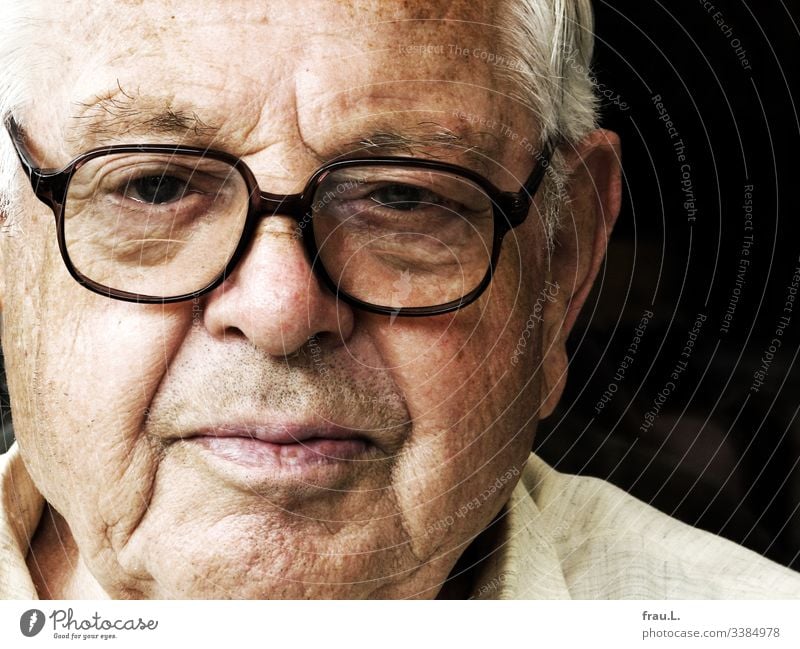 The new glasses on his old nose made him look critically. Man Human being Face Portrait photograph Eyeglasses Senior citizen Male senior critical view Skeptical