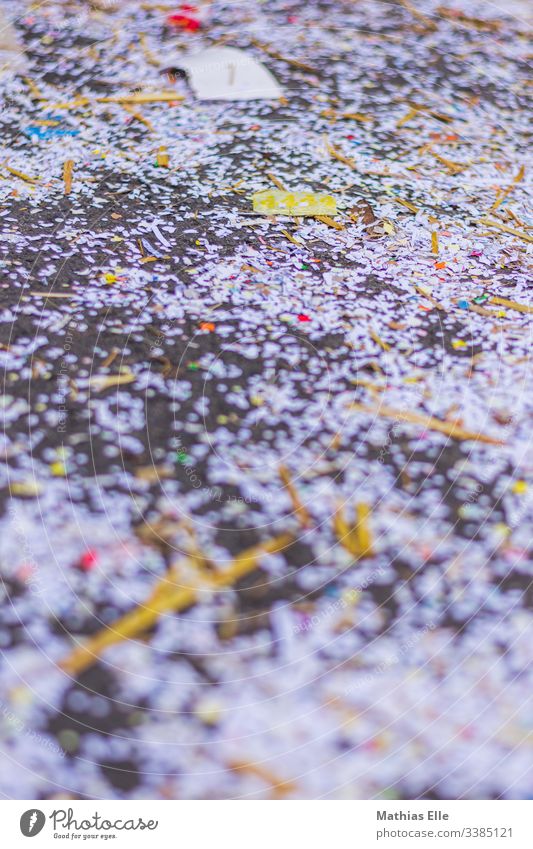 Colorful confetti on the street Colour photo Confetti Happiness Street Exterior shot Multicoloured Lie Structures and shapes Bird's-eye view Sidewalk Light