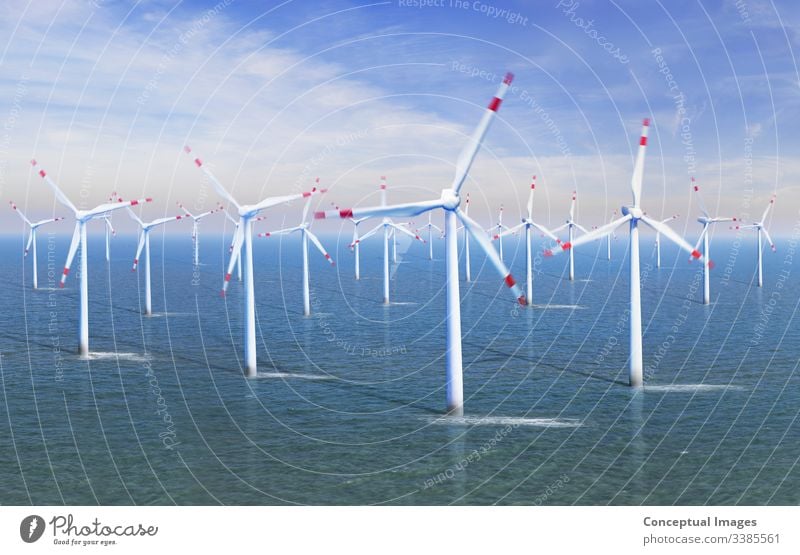 Elevated view of a Wind farm at sea alternative alternative energy efficiency electric electricity environment environmental environmental conservation