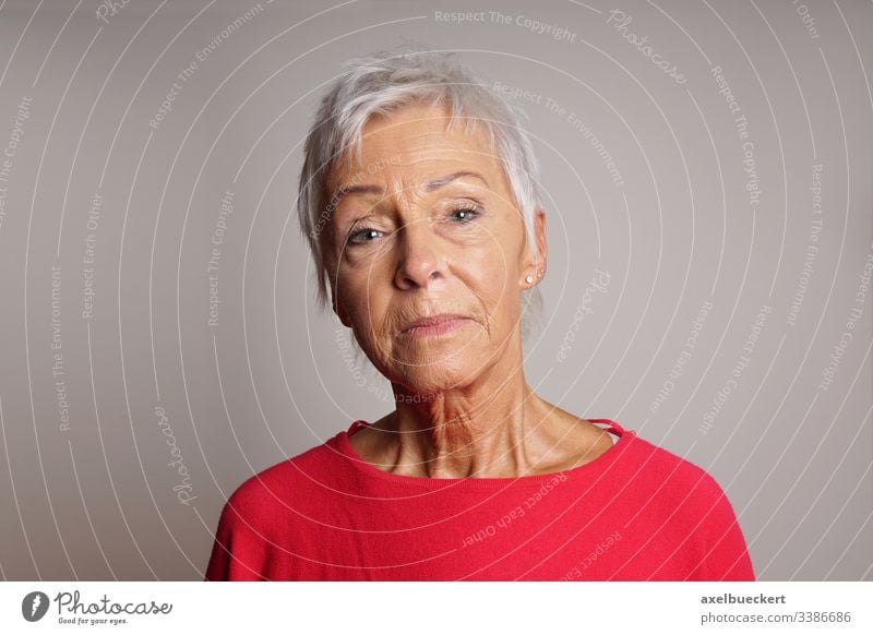 mature woman with her head held high - a Royalty Free Stock Photo from  Photocase