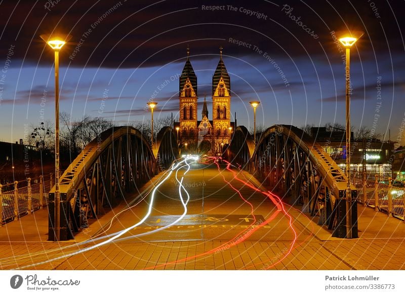 bicycle bridge Freiburg im Breisgau Herz Jesu Chruch Symmetry City trips Sightseeing vacation travel Germany Europe Baden-Wuerttemberg light traces Night shot