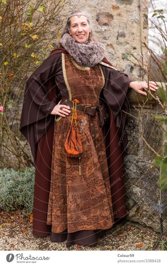 Impressive robed Lady clothing medieval garment woman brocade velvet historic retro history tradition culture costume ornament lady aristocracy festival festive