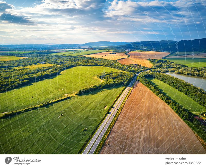 Summer landscape with fields, meadows, lake and mountains. Aerial view water summer aerial Slovakia panorama alpine Tatras park hill outdoor picturesque sunny