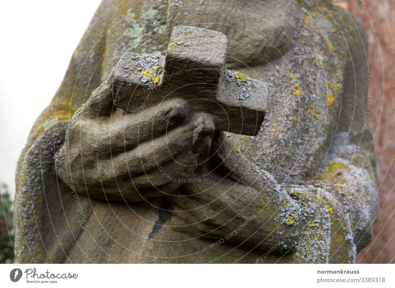 holy figure, hands holding a cross, detail Stone statue Crucifix Stone sculpture Sculpture Figure Christian Christianity Holy stop religion Religion and faith