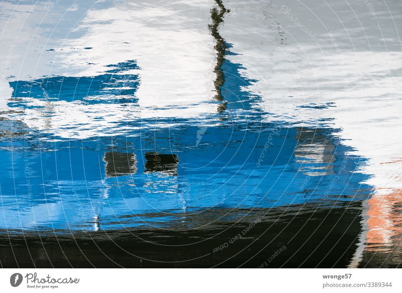 Reflection of a blue fishing boat in the water Surface of water ,Reflection Mirror image Waves Exterior shot Water Colour photo Deserted Water reflection Blue