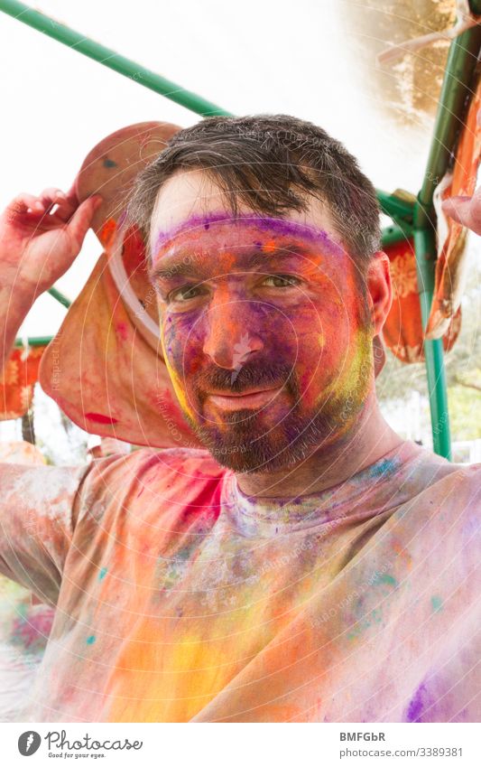 man colored in holi festival male excited crazy enjoying festival of colours men tourism concept happiness summer holy fun travel india people celebration happy