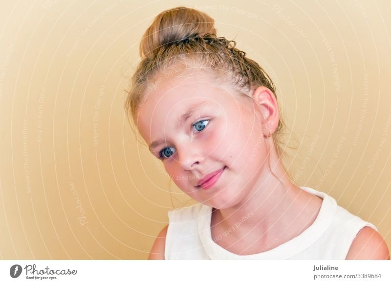 Sweet Girl 7 years old blonde with blue eyes - a Royalty Free Stock Photo  from Photocase