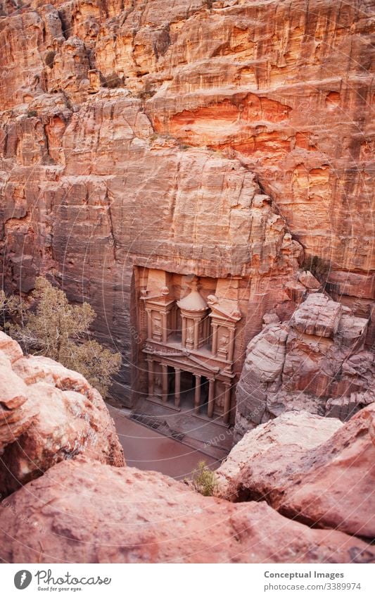 Elevated view of Al Khazneh - the treasury, ancient city of Petra,  Jordan.  Asia. adventure antique archaeology archeology architecture bedouin carved