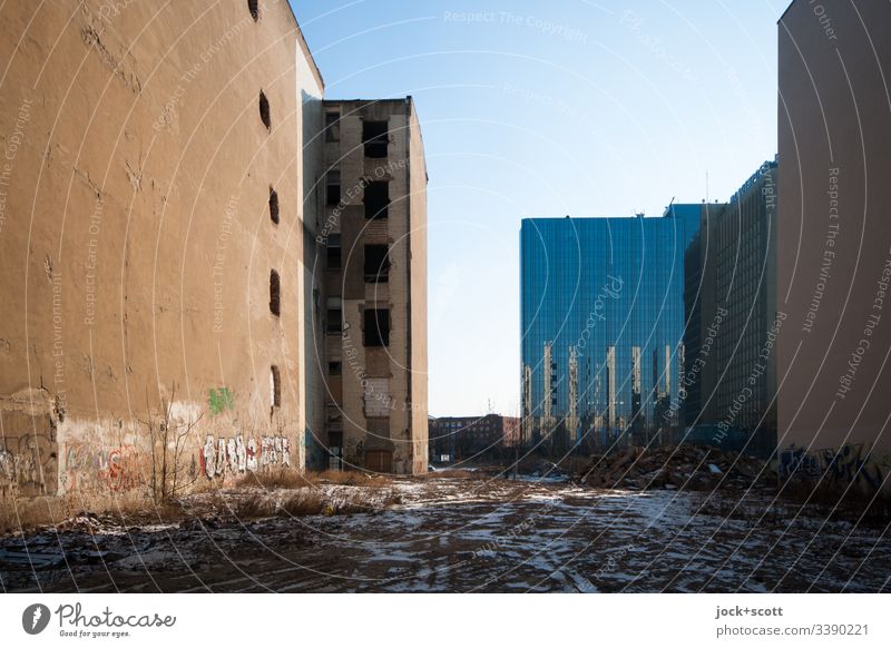 unused land in the middle of the city Sunlight Shadow Fire wall Fallow land Office building Winter FALLOW LAND Facade Downtown construction gap Change