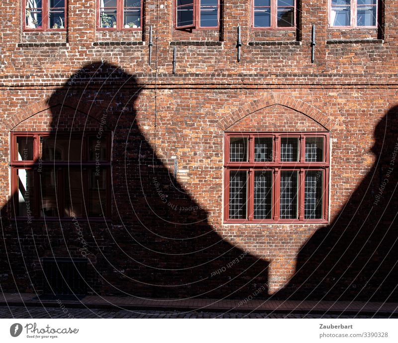 Red brick façade with window and shadow of a house opposite Facade Shadow Brick Window Wall (building) House (Residential Structure) Brick red