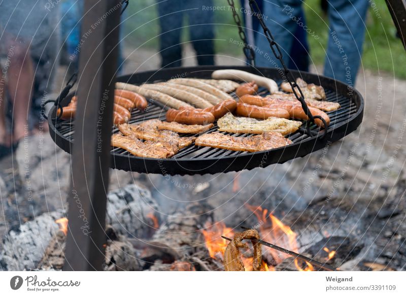 barbecue BBQ Party Meat Steak Sausage Exterior shot Grill Hot Delicious Food BBQ season Camp fire atmosphere Fire campfire