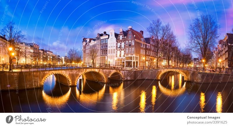 Keizersgracht Canal at dusk amsterdam architecture bridge canal capital city dutch europe evening famous holland illuminated keizersgracht canal landmark