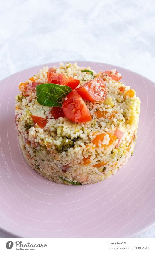 Homemade Vegetarian Couscous couscous vegetable vegetarian vegan food healthy food cherry tomatoes zucchini spinach carrots broccoli meal salad tabbouleh