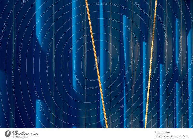Lines, ropes, light and shadow Construction site Container Rope lines Light Shadow Metal Blue Structures and shapes