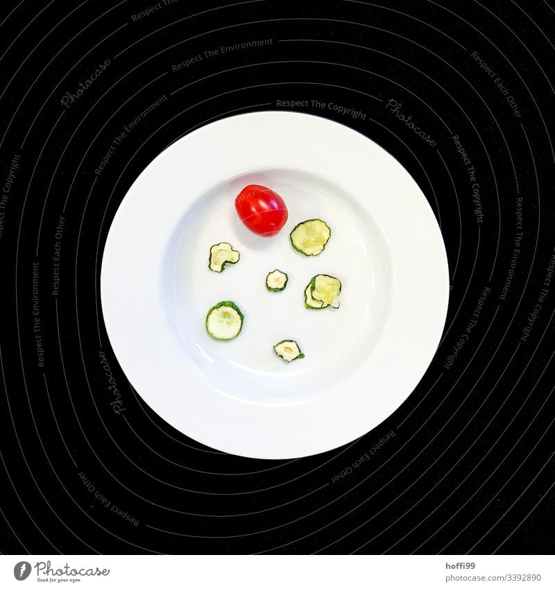 Plate with dried cucumber and tomato with black background Still Life Tomato Cucumber Slices of cucumber minimalism Minimalistic Art Round deep plate White