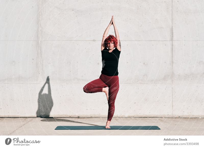 Yoga students showing different yoga poses. - a Royalty Free Stock Photo  from Photocase