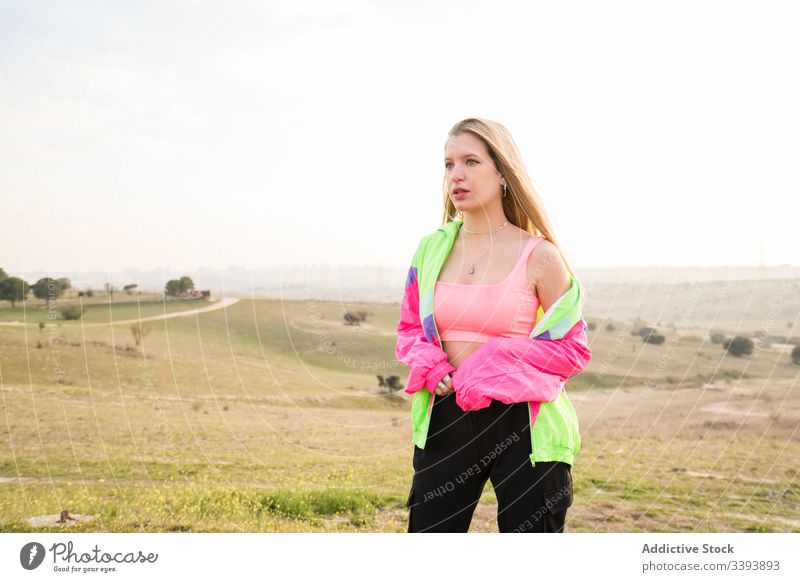 Fit and stylish young woman in athletic attire. Royalty-Free Stock