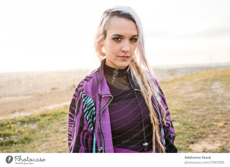 Female hipster in colorful clothes in countryside - a Royalty Free Stock  Photo from Photocase