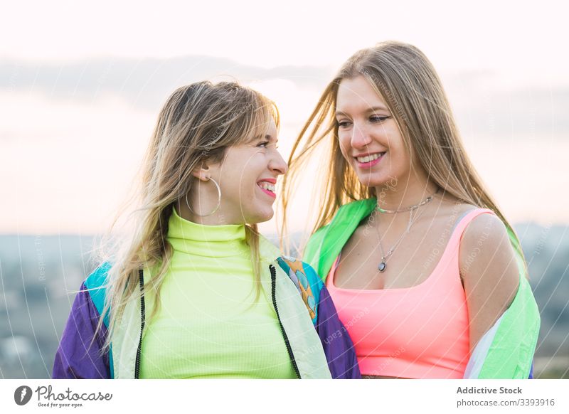 Group portrait of diverse young women wearing clothes in hipster