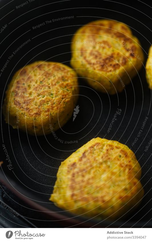 Appetizing vegetable cutlets frying in pan on stove traditional grill meal food cuisine recipe roast snack dish rustic cooking delicious herb roasted homemade