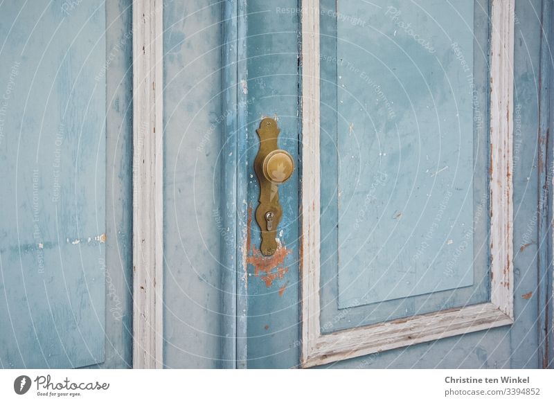 old blue door with peeling paint Door Old Ancient Blue bluish White peeled off Doorknob Beautiful Background picture Transience Past Deserted Decline Detail