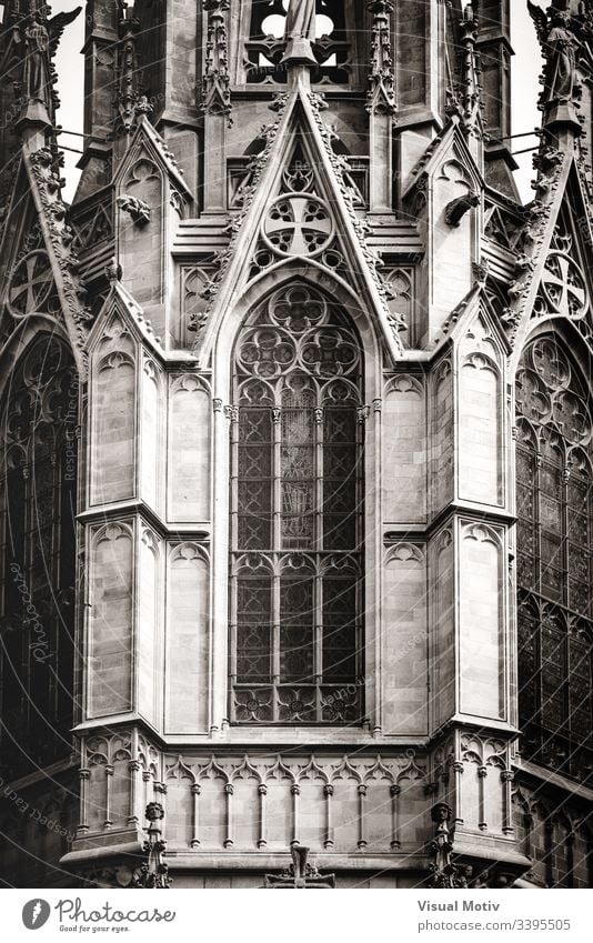Sculpted filigrees of a gothic cathedral main tower in black and white architecture gothic style basilica outdoors exterior architectural detail built structure