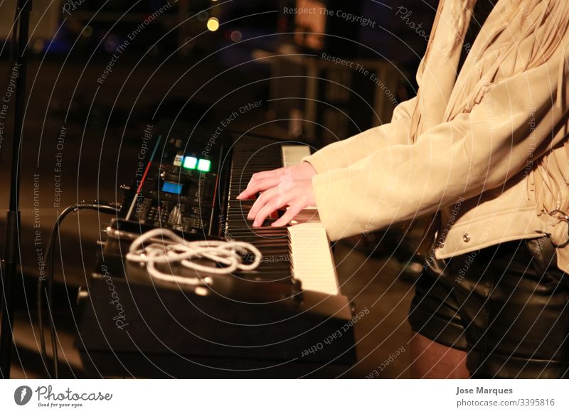 pianist at a music concert Piano Girl Hands Music Play piano Interior shot Musical instrument Art Musician Human being Show Concert Keyboard Playing Detail