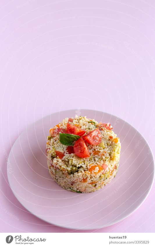 Homemade Vegetarian Couscous couscous vegetable vegetarian vegan food healthy food cherry tomatoes zucchini spinach carrots broccoli meal salad tabbouleh