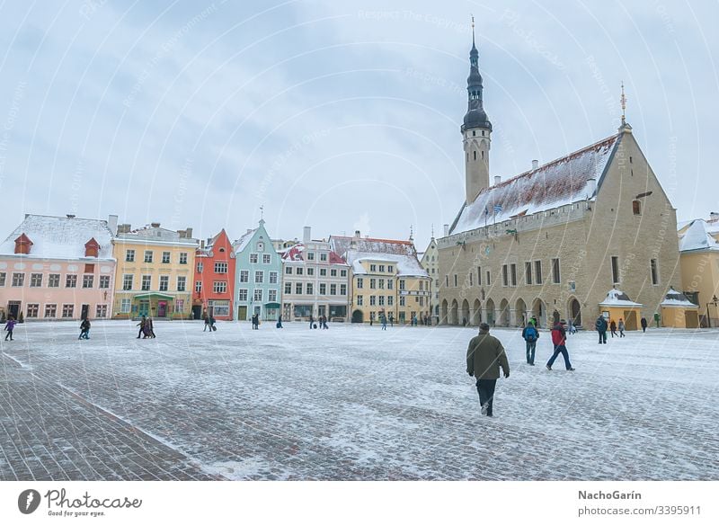 Medieval Town Hall Square of Tallinn during winter, Estonia tallinn estonia town hall square city snow people capital old medieval travel europe building street