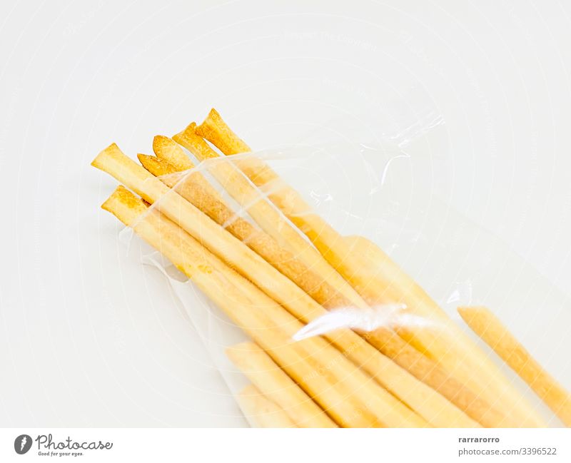 A group of Italian breadsticks isolated on a white background food snack bread stick bread sticks appetizer italian baked delicious fresh meal cuisine closeup