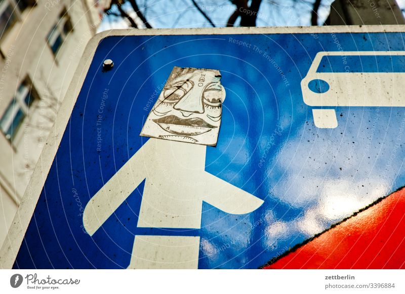 traffic sign on the outside Berlin grimace Face illustartion Deserted Schöneberg Play street Town Copy Space urban alienation Road sign Addition