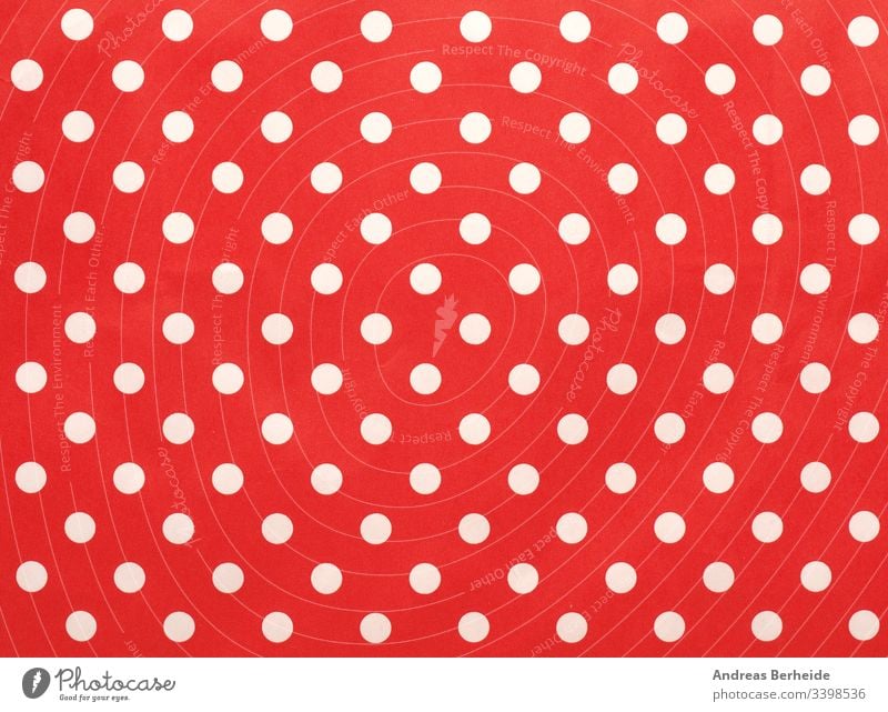 Paper texture with white dots on red using as background image polka dot textured simple material detail holiday row cover modern wrapping composition fashion
