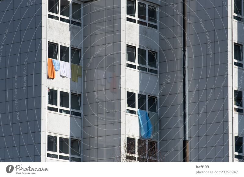 Sheets and towels hanging out of the window of a block of flats - washing day High-rise Towel Window Facade Wall (building) Wall (barrier) Poverty Blanket