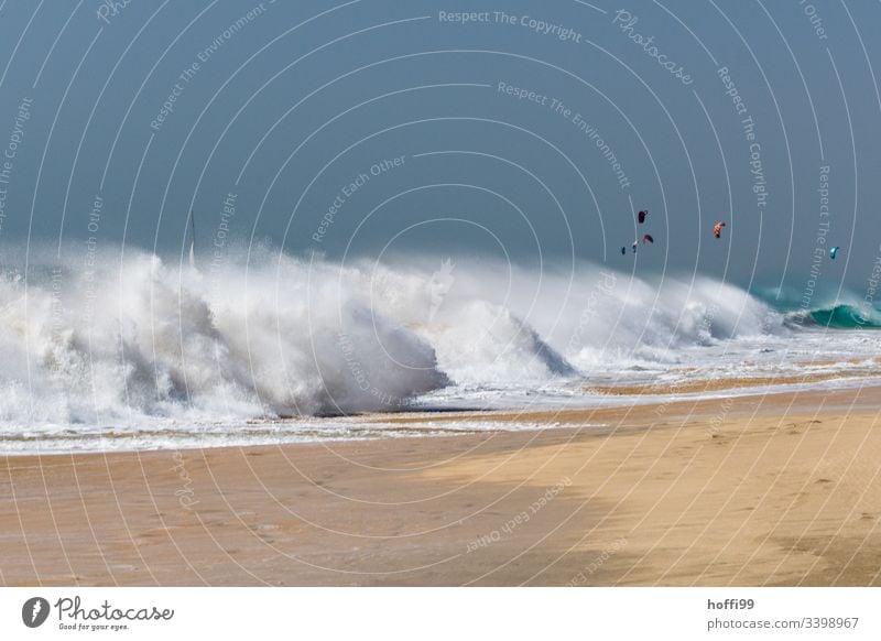 stormy Atlantic waves breaking on the beach Water Summer Foam Surf Force Nature Strong Energy Ocean Waves Gigantic Atlantic Ocean Threat White crest Gale