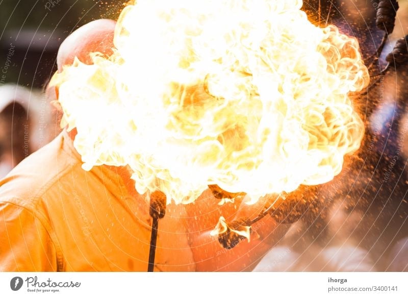 Fire show artist breathe fire in the dark jamp Danger Power actions activity arts background black burning business circus dramatic exhibition exploding fakir