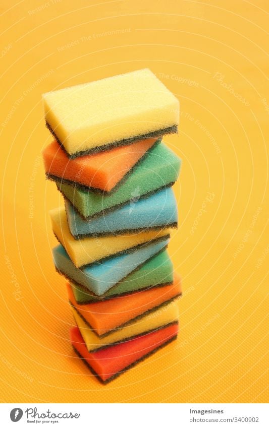 Stack kitchen sponges on yellow table background. Cleaning sponge. colorful kitchen sponges. Background sponge Abstract Art Banner Bathroom Cleaner