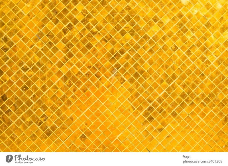 Closeup view of many gold shiny squares surface - a Royalty Free