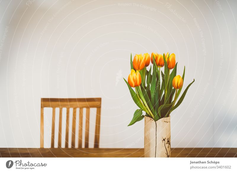 beautiful tulips in vase on the table as a gift for Mother's Day heyday flower decoration Tulip background Beautiful Beauty and beauty Blossom Bouquet Bright