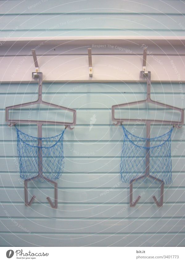 Three empty hooks with coat hanger and net, on white coat rack, in a closed swimming pool Swimming & Bathing Swimming pool coat hook wardrobe Checkmark