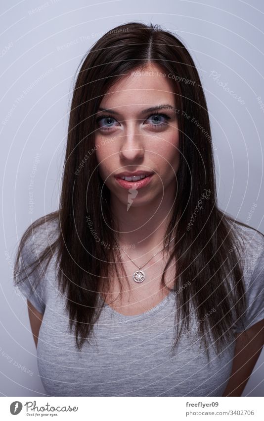 Portrait Of A Woman Touching Her Hair A Royalty Free Stock Photo From Photocase